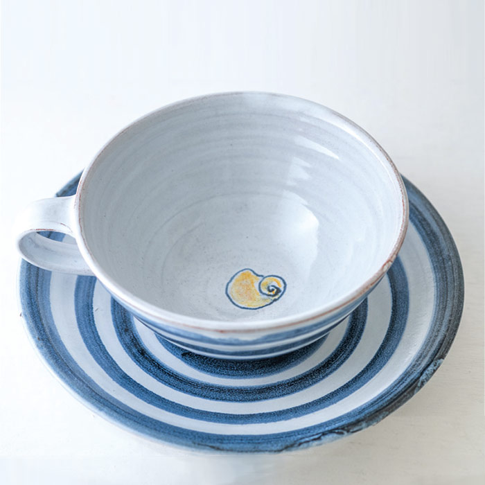 Blue and white stripped tea cup