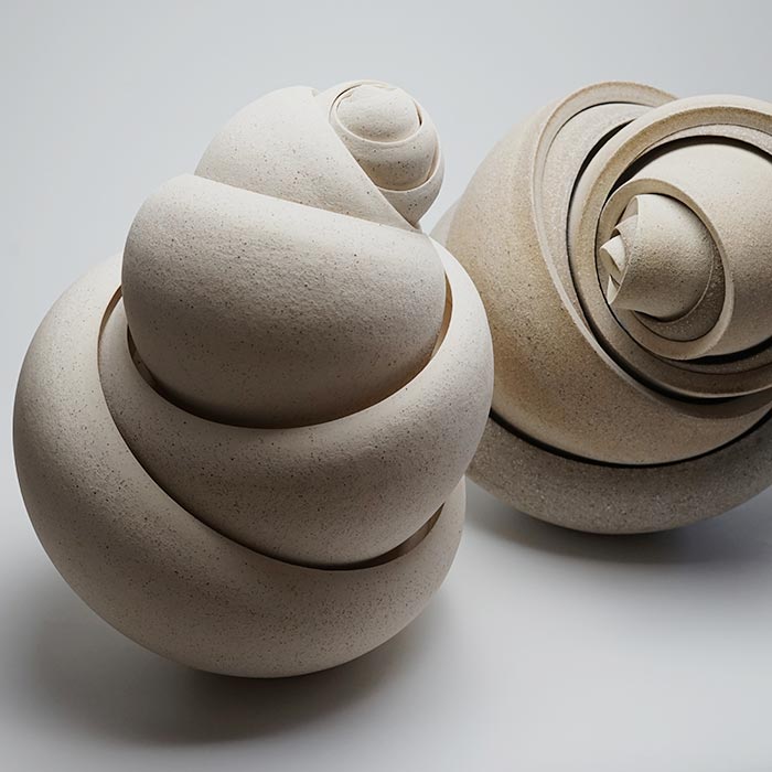 Reach and Turn sculpture, two variants by Matthew Chambers